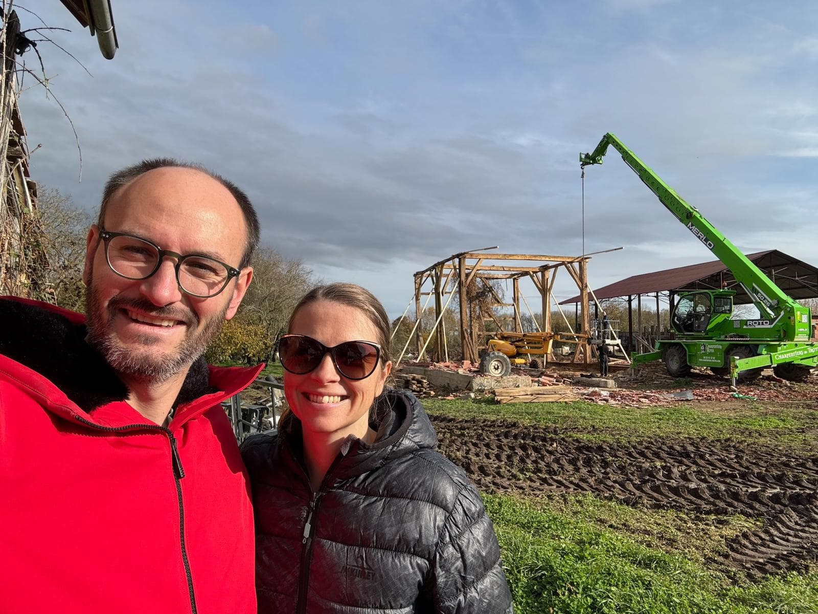 Céline and Sébastien LeSeurre at the barn site in Champagne, France, before it was dismantled.