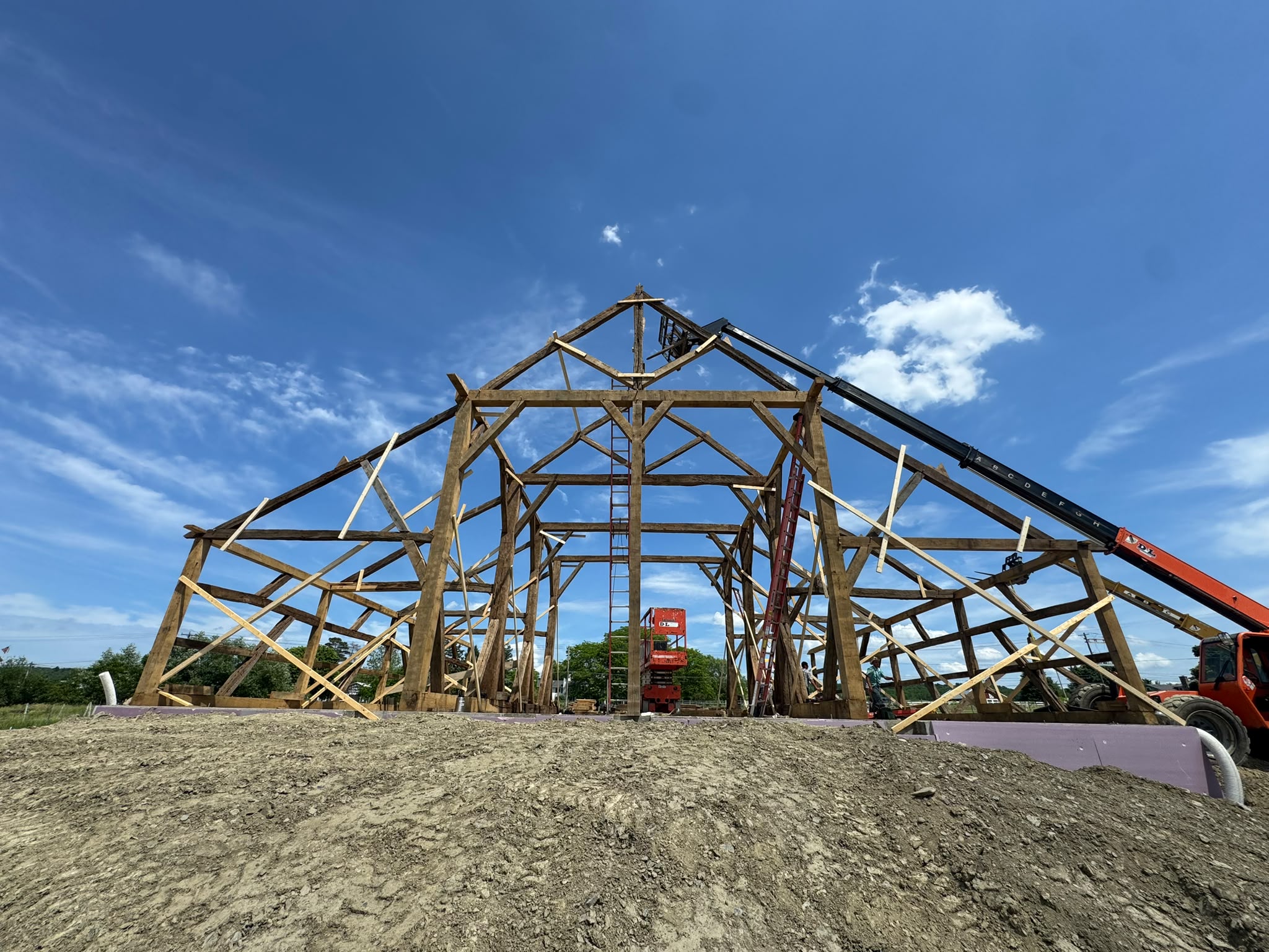 The oak frame of the barn standing again above Seneca Lake.